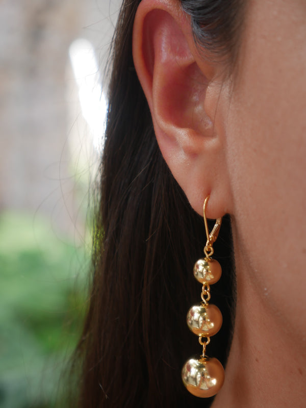 earrings, gold earrings, gold ball earrings, long earrings, statement earrings, gold jewelry, dangly earrings, big earrings, fashion jewelry, fine jewelry, nice earrings, big earrings, chunky gold jewelry, gold vermeil jewelry, nice earrings, ball earrings, gold plated, designer, large ball earrings, long earrings, statement jewelry, earrings with three balls, chanel inspired earrings, nickel free, popular, gift idea earrings 