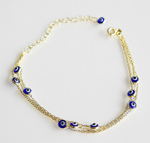 bracelets, evil eye bracelets, gold plated bracelets, gold evil eye bracelets, dainty evil eye bracelets, evil Gold Evil Eye Bracelet Multi-strand .925 sterling silver waterpoof Kesley Boutique Lucky bracelets for men and women evil eye bracelet with multiple chains cute bracelets that will not tarnish jewelry store in Brickell in Miami Kesley Boutique gold plated evil eye bracelet